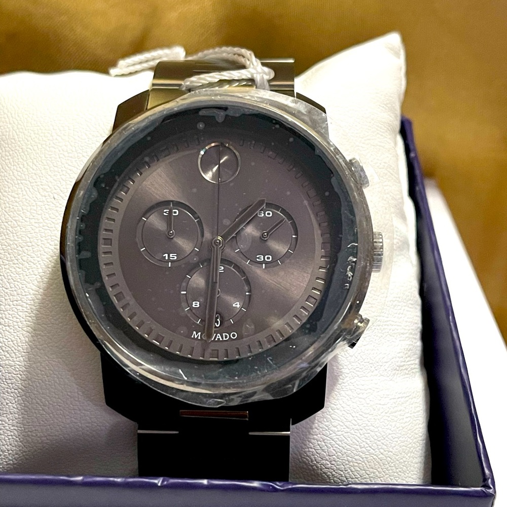 NWT Movado mens gunmetal gray stainless steel bracelet watch.